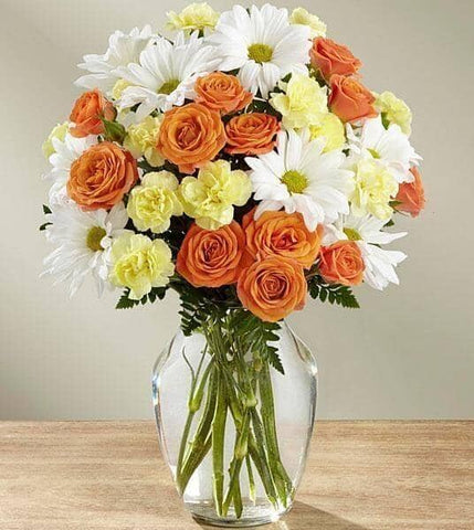 Products Sweet Splendor™ Bouquet - white daisies , orange spray roses , yellow mini carnations , vase arrangement