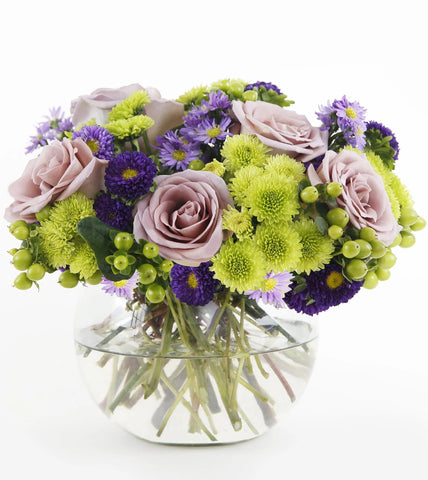 A Splendid Day™ Bouquet - lavender roses , lavender monte casino asters , purple matsumoto asters , green hypericum berries , green button poms , vase arrangement