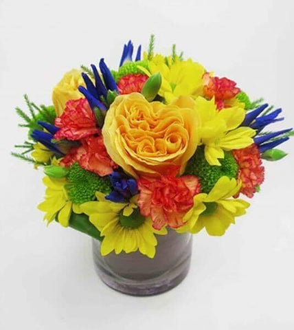 yellow roses , mini novelty carnations , irises , green daisies , yellow daisies , greens , vase arrangement