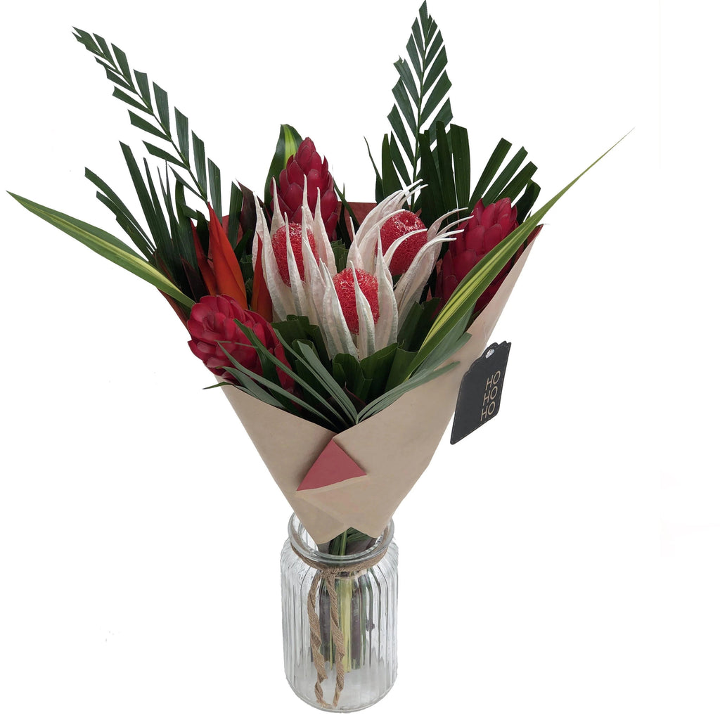 HoHo™ Holiday Bouquet Toronto Flower Co.  is a tropical design with exotic flowers that will amaze any flower lover this holiday season. Looking for a different yet stunning and long-lasting gift? This is it!