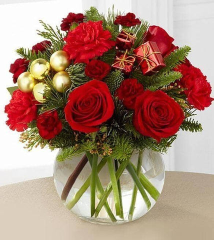 holiday gold bouquet - red roses , burgundy mini carnations , red carnations , holiday greens , vase arrangement