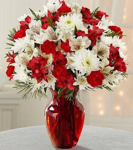 Joy to the World Holiday Bouquet - red lilies , red mini carnations , white chrysanthemums , white lilies , vase arrangement