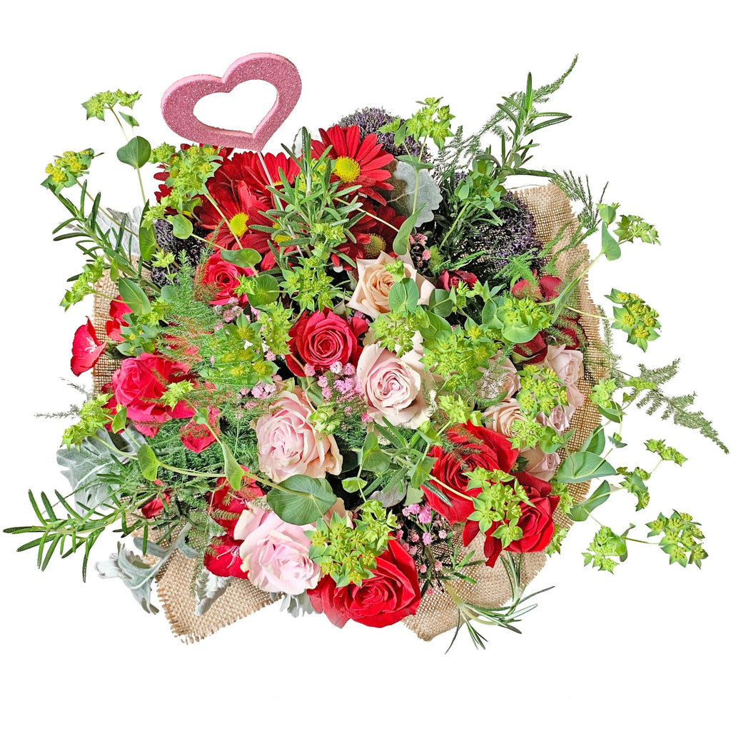 Wild Love™ Bouquet by Toronto Flower Co. expresses all the love you feel! Mainly composed of red and pink roses, accentuated by special fillers and foliage to make it a striking design.