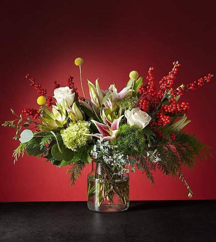 Wilds of Winter™ Bouquet by Toronto Flower Co. is a mix of multiple varieties that makes this arrangement a classic seasonal design with a modern twist.